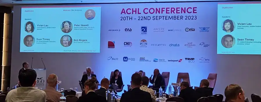 Digitisation panel on stage at the ACHL Conference 2023 in Athens, with ALS among the sponsor logos